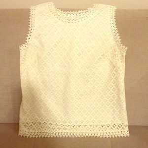 Cream sleeveless blouse